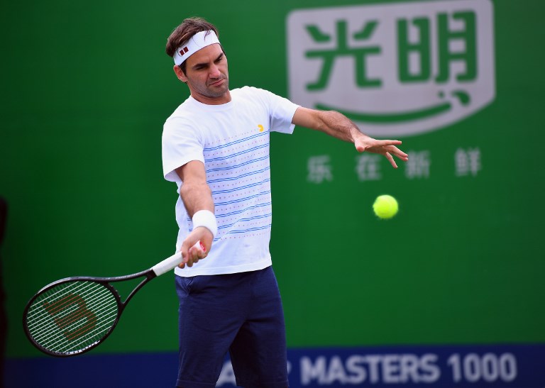 Roger Federer of Switzerland hits a return as he takes part in a training session at the Shanghai Masters tennis tournament on October 8, 2018. PHOTO/AFP