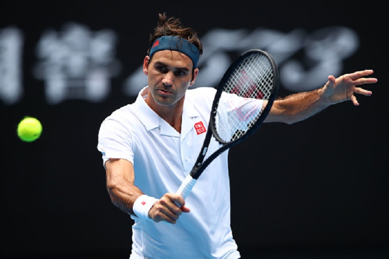 Roger Federer of Switzerland plays a backhand in his second round match against Daniel Evans of Great Britain during day three of the 2019 Australian Open at Melbourne Park on January 16, 2019 in Melbourne, Australia. PHOTO/GettyImages