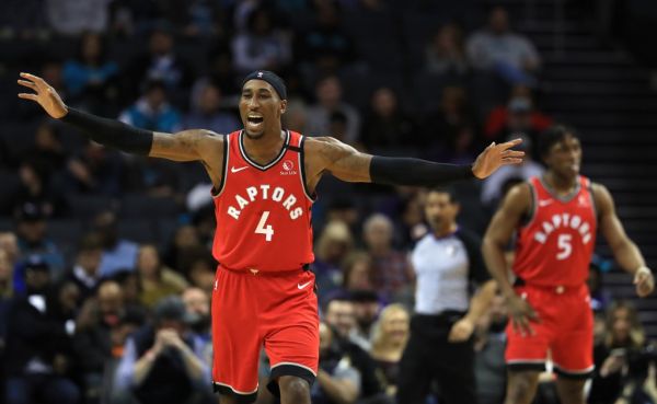 Rondae Hollis-Jefferson #4 of the Toronto Raptors reacts after a play against the Charlotte Hornets during their game at Spectrum Center on January 08, 2020 in Charlotte, North Carolina. PHOTO | AFP