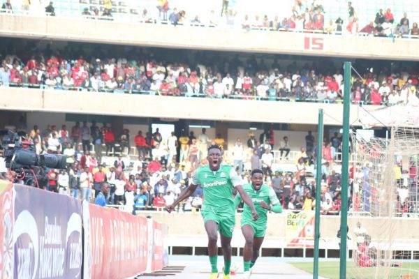 Ronney Onyango wheels off in celebration after scoring against Shabana. PHOTO| AFP