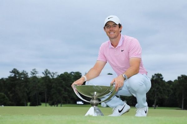Rory McIlroy of Northern Ireland celebrates with the FedExCup trophy after winning during the final round of the TOUR Championship at East Lake Golf Club on August 25, 2019 in Atlanta, Georgia. PHOTO | AFP