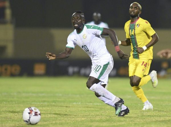 Sadio Mane (#10) from Senegal runs with the ball from a Congolese player at the Lat-Dior stadium in Thies, Senegal, November 13, 2019 during a qualifying game ahead of the 2021 Africa Cup of Nations (CAF). PHOTO | AFP