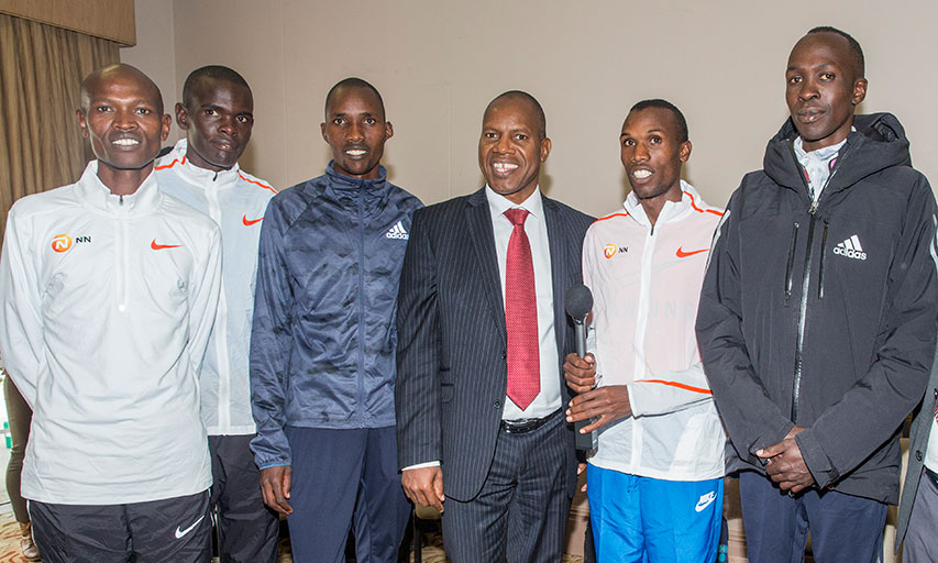 Sanlam Kenya Group CEO, Patrick Tumbo (centre) poses with Team Kenya for the 2018 Cape Town Marathon. PHOTO/Courtesy