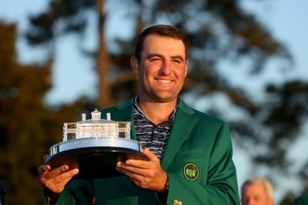 Scottie Scheffler poses with the Masters trophy during the Green Jacket Ceremony after winning the Masters at Augusta National Golf Club on April 10, 2022 in Augusta, Georgia. PHOTO | AFP