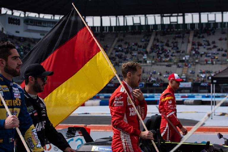 Sebastian Vettel and Mick Shumacher of Germany walk with their flag during the Parade of Nations before the Nations Cup at the Race of Champions on Day 2 at Autodromo Hermanos Rodriguez on January 19, 2019 in Mexico City, Mexico. PHOTO/GettyImages