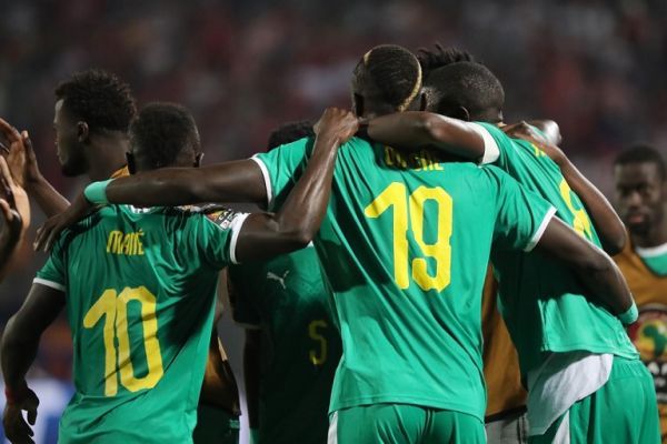 Senegal players celebrate scoring their side's first goal during the 2019 Africa Cup of Nations semi-final soccer match between Senegal and Tunisia at the 30 June Stadium. PHOTO | AFP