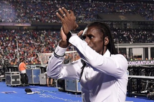 Senegal's coach Aliou Cisse greets the supporters after their defeat in the 2019 Africa Cup of Nations (CAN) Final football match between Senegal and Algeria at the Cairo International Stadium in Cairo on July 19, 2019. PHOTO/AFP