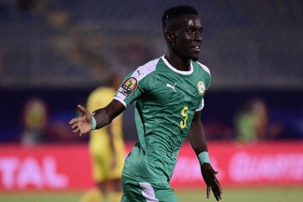 Senegal's midfielder Idrissa Gueye celebrates after scoring during the 2019 Africa Cup of Nations (CAN) quarter final football match between Senegal and Benin at the 30 June stadium in Cairo on July 9, 2019. PHOTO/AFP