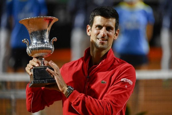 Serbia's Novak Djokovic poses with his trophy after winning the final match of the Men's Italian Open against Argentina's Diego Schwartzman at Foro Italico on September 21, 2020 in Rome, Italy. PHOTO | AFP