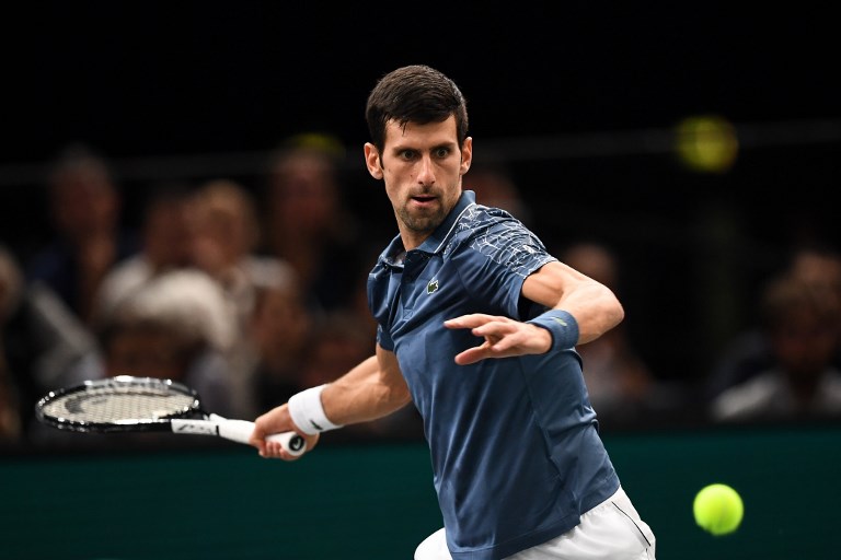 Serbia's Novak Djokovic returns the ball to Croatia's Marin Cilic during their men's singles quarter-final tennis match on day five of the ATP World Tour Masters 1000 - Rolex Paris Masters - indoor tennis tournament at The AccorHotels Arena in Paris, on November 2, 2018. PHOTO/AFP