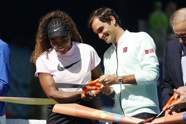 Serena Williams of the United States and Roger Federer of Switzerland cut the ribbon during the Ribbon Cutting ceremony on Day 3 of the Miami Open Presented by Itau on March 20, 2019 in Miami Gardens, Florida. PHOTO | AFP