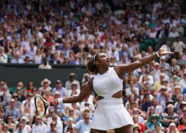 Serena Williams of U.S.A. hits a ball during the ladies’ singles semi-final of the Championships, Wimbledon against Barbora Strycova of Czech Republic at the All England Lawn Tennis and Croquet Club in London, United Kingdom on July 11, 2019. Serena Williams won the match to advance final. PHOTO | AFP