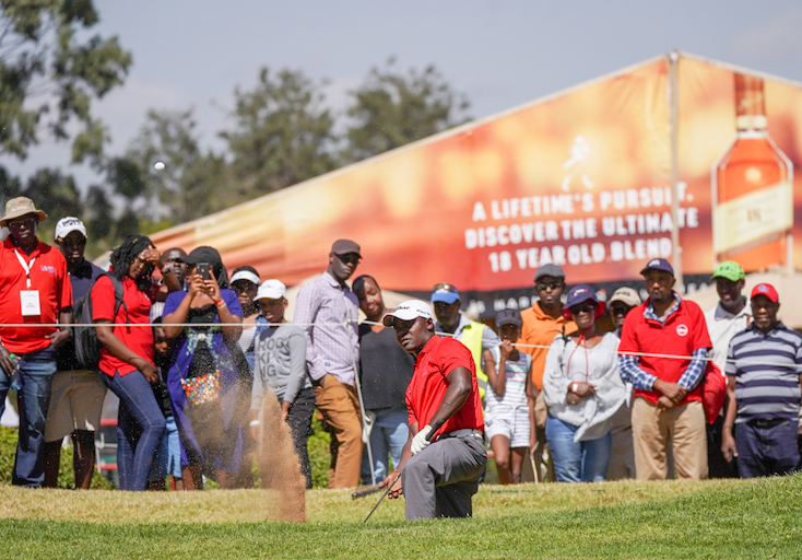 Simon Ngige hits fourth shot off the 18th green bunker on round three of the 2019 Magical Kenya Open Golf Championship on Saturday, March 19, 2019. PHOTO/Courtesy