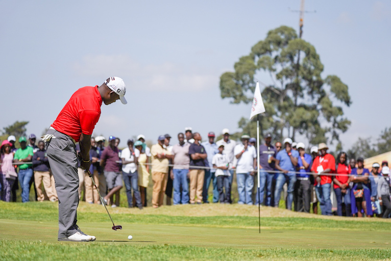 Simon Ngige plays his bogey putt at the 18th green of the Karen Country Club on Round Three of the 2019 Magical Kenya Open Golf Championship on Saturday, March 19, 2019. PHOTO/Organisers