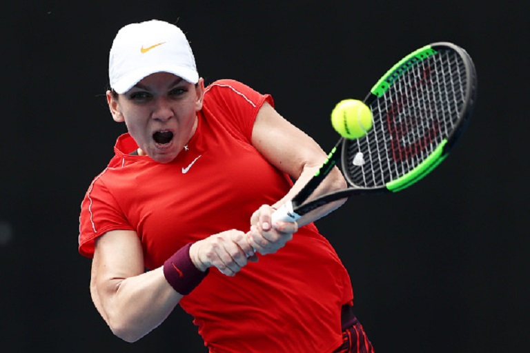 Simona Halep of Romania plays a backhand in her 2nd round match against Ashleigh Barty of Australia during day four of the 2019 Sydney International at Sydney Olympic Park Tennis Centre on January 09, 2019 in Sydney, Australia. PHOTO/GettyImages