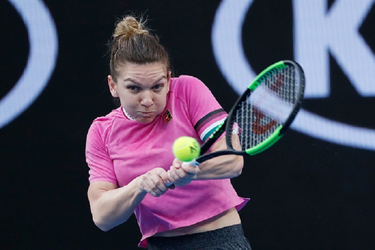 Simona Halep of Romania plays a backhand in her first round match against Kaia Kanepi of Estonia during day two of the 2019 Australian Open at Melbourne Park on January 15, 2019 in Melbourne, Australia. PHOTO/GettyImages