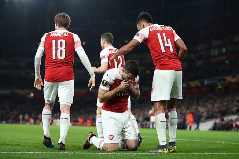 Sokratis Papastathopoulos of Arsenal celebrates after scoring a goal to make it 3-0 and 3-1 on Aggregate during the UEFA Europa League Round of 32 Second Leg match between Arsenal and BATE Borisov at England on February 21, 2019 in London, United Kingdom. PHOTO/GettyImages