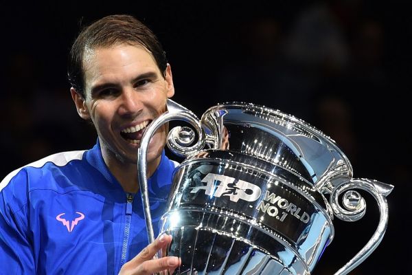 Spain's Rafael Nadal holds up the 2019 ATP Tour Year-End Number One trophy at a presentation ceremony on day six of the ATP World Tour Finals tennis tournament at the O2 Arena in London on November 15, 2019. Spain's Rafael Nadal beat Greece's Stefanos Tsitsipas 6-7; 6-4, 7-5. PHOTO | AFP