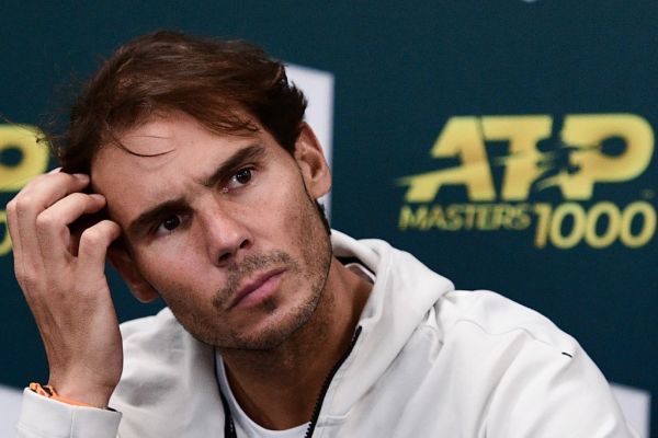 Spain's Rafael Nadal reacts as he addresses a press conference to announce his withdrawal from the men's singles semi-final tennis match and the ATP World Tour Masters 1000 - Rolex Paris Masters - indoor tennis tournament at The AccorHotels Arena in Paris on November 2, 2019. PHOTO | AFP