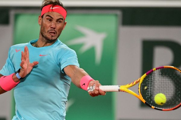 Spain's Rafael Nadal returns the ball to Italy's Jannik Sinner during their men's singles quarter-final tennis match on Day 10 of The Roland Garros 2020 French Open tennis tournament in Paris on October 6, 2020. PHOTO | AFP