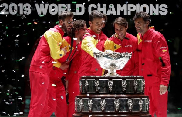 Spain team's tennis players Rafael Nadal, Roberto Bautista Agut, Sergi Bruguera, Feliciano Lopez , Marcel Granollers and Pablo Carreno celebrate during the final ceremony of the 2019 Davis Cup at La Caja Magica on November 24, 2019 in Madrid, Spain. PHOTO | AFP