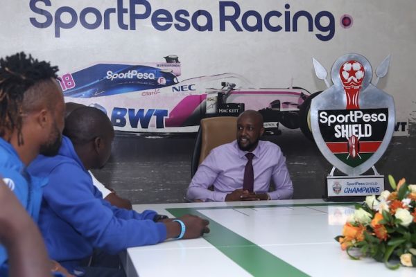 SportPesa CEO, Captain Ronald Karauri (right) listens to Bandari FC representatives (L to R), Captain Felly Mulumba, head coach Bernard Mwalala and CEO Edward Oduor (partly hidden) when the 2019 SportPesa Shield winners paid him a courtesy call in Nairobi on Monday, June 3, 2018. PHOTO/SPN/Anthony Mwaki 