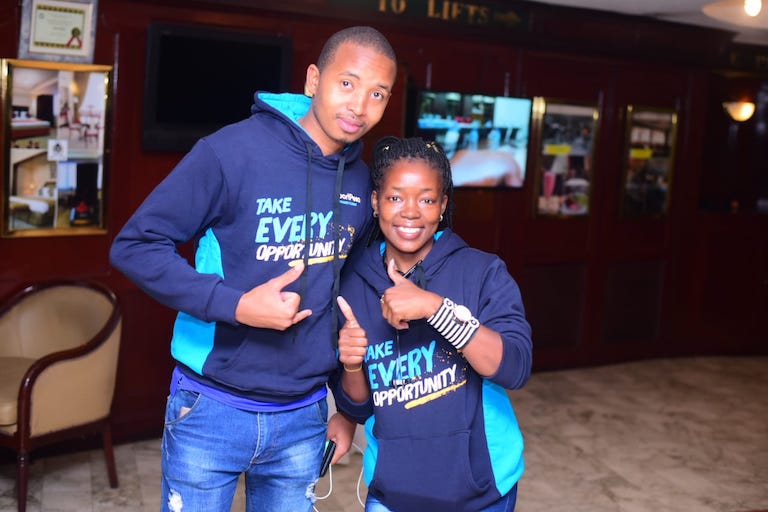 SportPesa Digital Executives, Dennis Maina and Teresia Akoth pose ahead of the latter's departure to the UK to cover the historic Gor in Everton tour on November 2, 2018. PHOTO/SPN