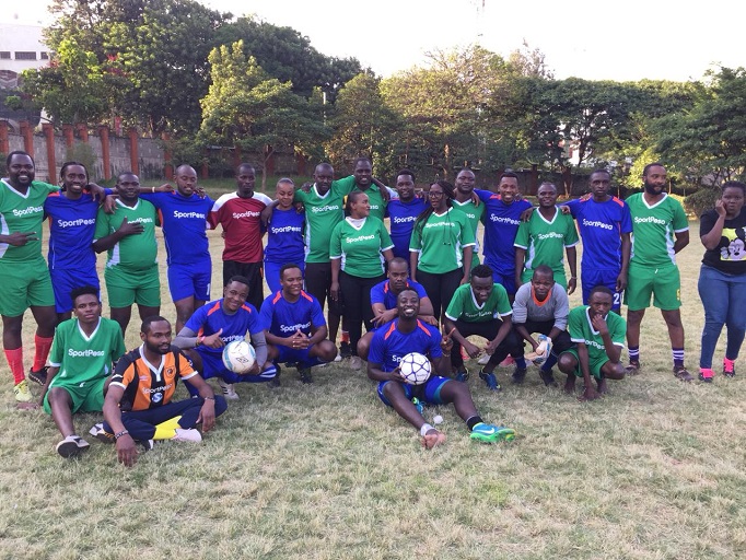 SportPesa FC and Ghetto Radio FC pose for a picture before playing a friendly match in memory of James Odour aka Odu Cobra at the LCVR Grounds on Thursday, January 17, 2019. PHOTO/SPN