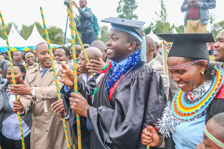 SportPesa Mega Jackpot winner, Cosmas Korir (second right) and his spouse (right) join guests in dancing during his home coming ceremony on December 11, 2018 in Litein, Bomet County. PHOTO./Brian Kinyanjui/SPN