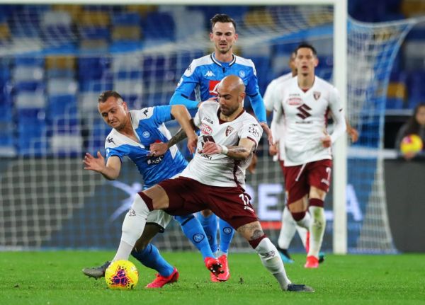 Stanislav Lobotka of Napoli and Simone Zaza of Torino during the football Serie A match SSC Napoli v Torino Fc at the San Paolo Stadium in Naples, Italy on February 29, 2020. PHOTO | AFP