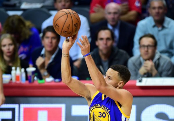 Steph Curry of the Golden State Warriors shoots for three against the Los Angeles Clippers during their NBA game in Los Angeles, California on November 19, 2015 where the Warriors defeated the Clippers 124-117. PHOTO | AFP