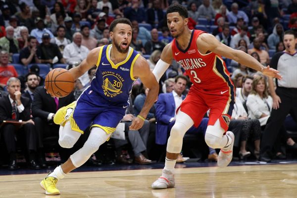 Stephen Curry #30 of the Golden State Warriors drives the ball around Josh Hart #3 of the New Orleans Pelicans at Smoothie King Center on October 28, 2019 in New Orleans, Louisiana. PHOTO | AFP