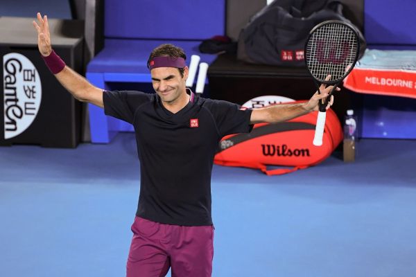 Switzerland's Roger Federer celebrates after victory against Steve Johnson of the US during their men's singles match on day one of the Australian Open tennis tournament in Melbourne on January 20, 2020. PHOTO | AFP