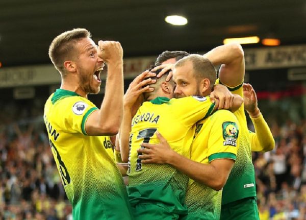 Teemu Pukki of Norwich City celebrates with teammates after scoring his team's third goal during the Premier League match between Norwich City and Manchester City at Carrow Road on September 14, 2019 in Norwich, United Kingdom.PHOTO/ GETTY IMAGES