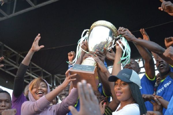 The 2019 Kothbiro Football Tournament champions Kingstone FC celebrate at Ziwani Grounds in Nairobi on August 3, 2019.PHOTO/KOTHBIRO