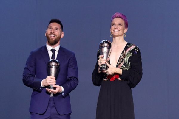 The Best FIFA Women's Player Award Winner Megan Rapinoe of Reign FC and United States and The Best FIFA Men's Player Award Winner Lionel Messi of FC Barcelona and Argentina pose for a photo with their trophies during The Best FIFA Football Awards 2019 at Teatro alla Scala on September 23, 2019 in Milan, Italy. PHOTO/GETTY IMAGES