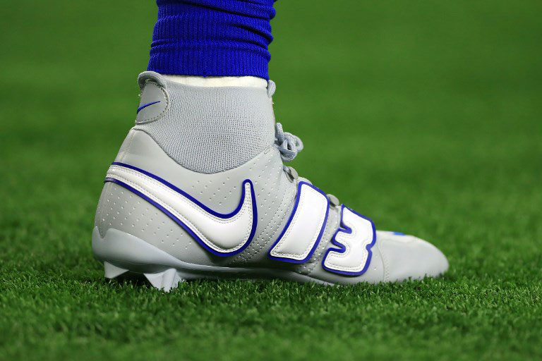 The custom nike shoes worn by Odell Beckham Jr. #13 of the New York Giants during warm ups before the game against the Dallas Cowboys at AT&T Stadium on September 16, 2018 in Arlington, Texas. PHOTO/AFP