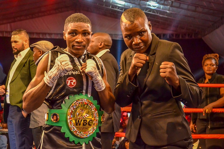 The present and past queens of Kenyan boxing, Fatuma 'Iron Fist' Zarika and Conjestina 'Hands of Stone' Achieng' (right) pose after the former retained her World Boxing Council Super Bantamweight title at Nairobi Fight Night 2 on Saturday, March 23, 2019. PHOTO/SPN