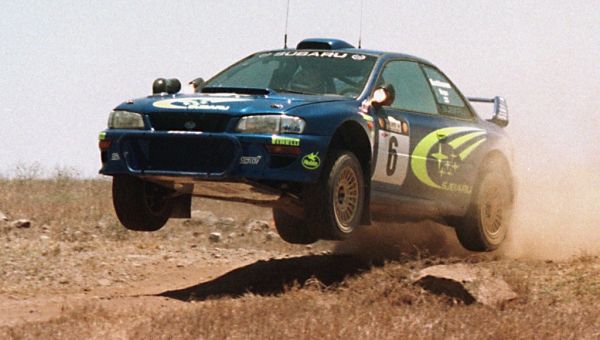 The Subaru Impreza WRC of Finns Juha Kankkunen and Juha Repo flies through the air 26 February during the safari Rally before his car developed electrical problems and was forced out. Spaniard Carlos Sainz won the stage. PHOTO | AFP