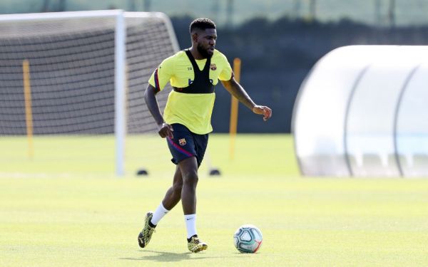 This handout pictured made available by FC Barcelona shows Barcelona's French defender Samuel Umtiti attending a training session at the Ciutat Esportiva Joan Gamper in Sant Joan Despi on May 8, 2020 as Spain prepares to ease its tough lockdown measures to prevent the spread of the COVID-19 disease. The Spanish government announced a deconfinement plan for professional footballers which initially allowed them to train separate from each other, with a maximum of six players on a field. PHOTO | AFP