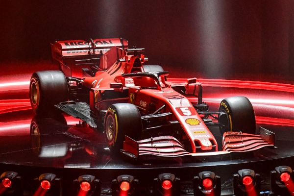 This photo taken and handout by the Ferrari Press Office on February 11, 2020 shows the new Ferrari Formula One SF1000 during its unveiling ceremony at Teatro Romolo-Valli in Reggio Emilia. PHOTO | AFP