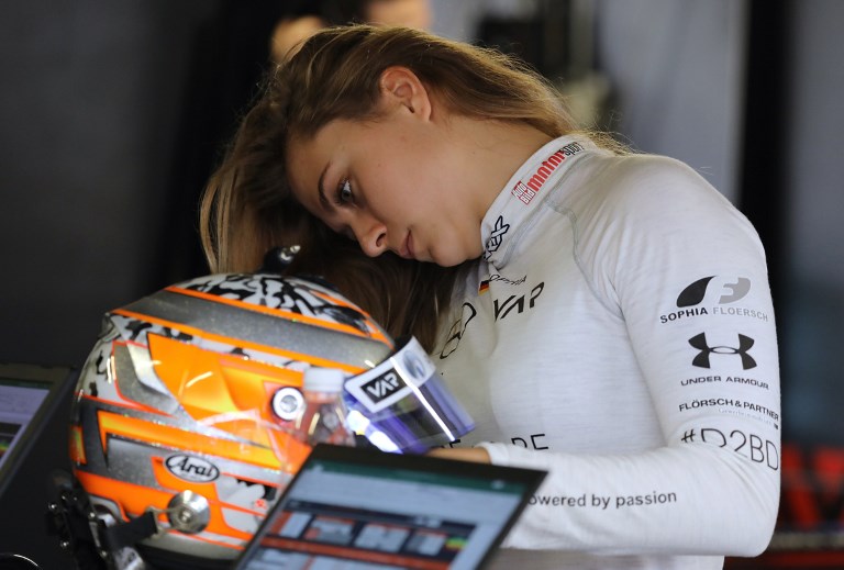 This photo taken on November 16, 2018 and provided by the South China Morning Post on November 19 shows Van Amersfoort Racing's 17-year-old Sophia Floersch in the pits at the Formula Three Macau Grand Prix in Macau.PHOTO/AFP