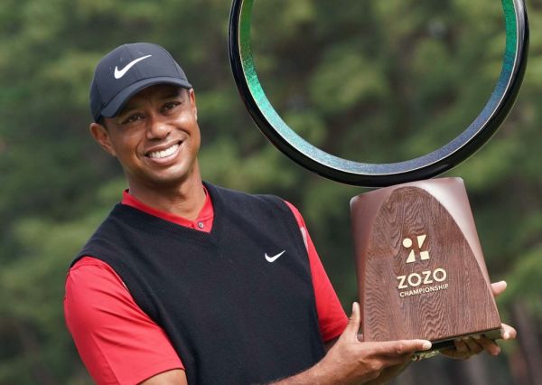 Tiger Woods, an American professional golf player, celebrates during an awarding ceremony of ZOZO CHAMPIONSHIP at Accordia Golf Narashino Country Club in Inzai City, Chiba Prefecture, Japan on October 28, 2019. 43-year-old Woods claimed his 82th PGA tournament to tie all-time victory records. PHOTO | AFP