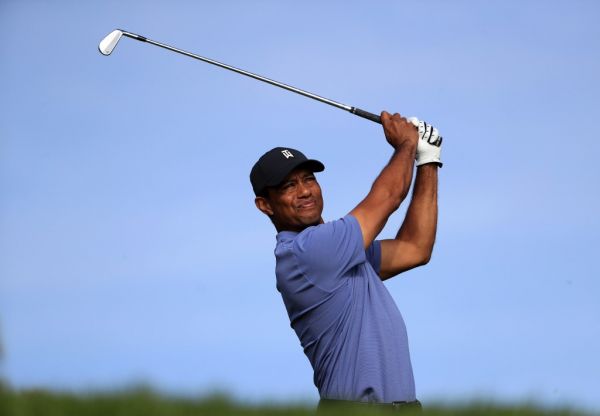 Tiger Woods plays his shot from the eighth tee during the first round of the Farmers Insurance Open on Torrey Pines North on January 23, 2020 in San Diego, California. PHOTO | AFP