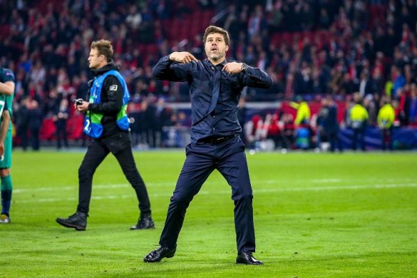 Tottenham Hotspur Manager Mauricio Pochettino says to fans its not about him and then points to the players during the UEFA Champions League, semi-final, 2nd leg football match between AFC Ajax and Tottenham Hotspur on May 8, 2019 at Johan Cruijff ArenA in Amsterdam, Netherlands. PHOTO/AFP