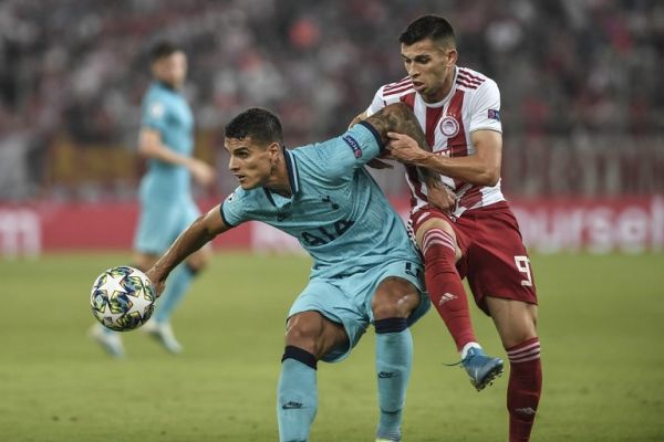 Tottenham Hotspur's Erik Lamela (L) vies with Olympiacos' Lazar Randjelovic during the UEFA Champions League Group B football match Olympiakos vs Tottenham Hotspur on September 18, 2019 at the Georgios Karaiskakis Stadium in Athens. PHOTO | AFP