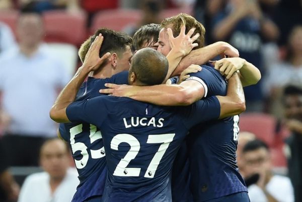 Tottenham Hotspur's Harry Kane (R) is congratulated by teammates after scoring during the International Champions Cup football match between Juventus and Tottenham Hotspur in Singapore on July 21, 2019. PHOTO | AFP