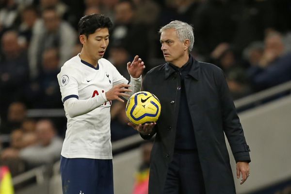 Tottenham Hotspur's South Korean striker Son Heung-Min (L) speaks with Tottenham Hotspur's Portuguese head coach Jose Mourinho (R) during the English Premier League football match between Tottenham Hotspur and Burnley at Tottenham Hotspur Stadium in London, on December 7, 2019.  PHOTO | AFP