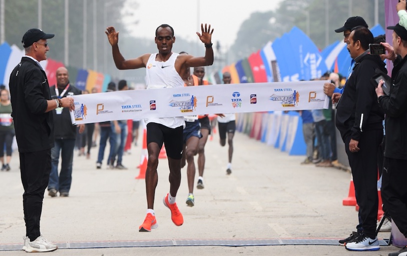 TSK25K 2018 men's winner Birhanu Legese pictured while crossing the line on Sunday, December 16. PHOTO/Courtesy/Procam International