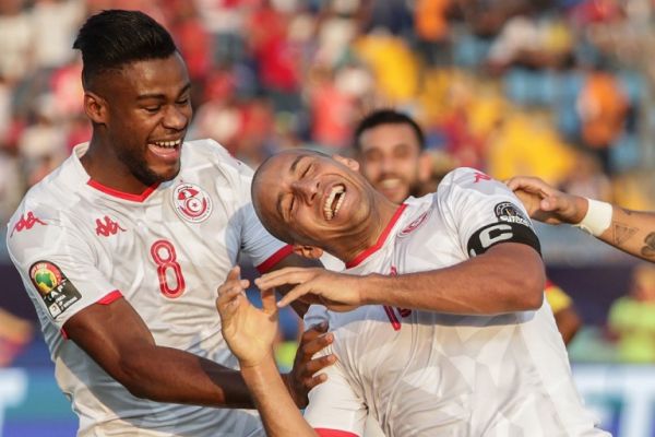 Tunisia's Wahbi Khazri (R) celebrates with his teammate Firas Chaouat, scoring his side's first goal during the 2019 Africa Cup of Nations Group E soccer match between Tunisia and Mali at Suez Sports Stadium. PHOTO | AFP